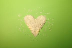 Rice grains on a green background