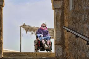 girl in a stroller with clothes on