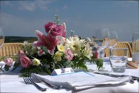 a beautiful bouquet of flowers on the restaurant table