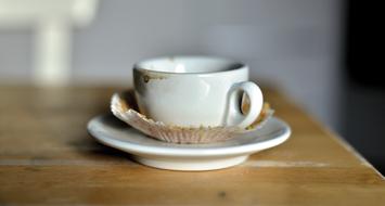 saucer and cup on the table
