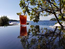 sweet cocktail on a glass table