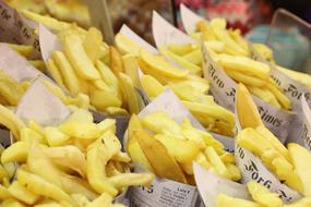 hot fried potatoes in paper