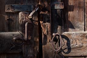 Iron lock on the old wooden door