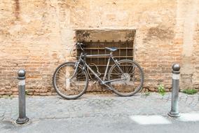 Bicycle parked against the wall