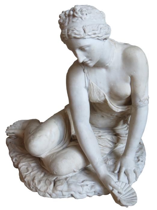sculpture of a girl sitting