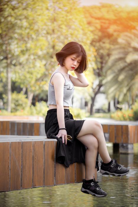 Short Hair Dressed Girl near pond