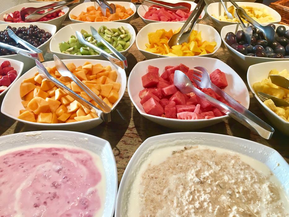 Tasty sliced snacks on a plate