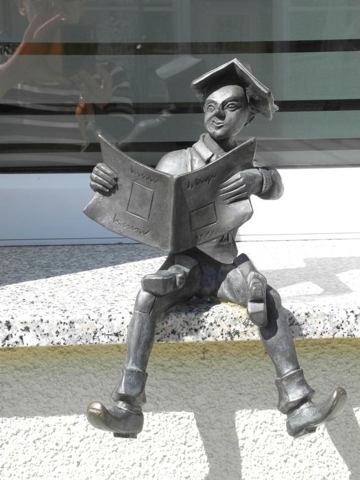 Small Sculpture Boy Reading On The