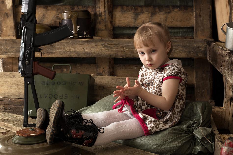 girl in a photo studio on Defender of the Fatherland Day