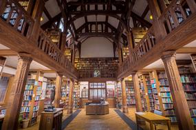 Beautiful Gladstones Library, with the colorful lights and books on the shelves in Wales