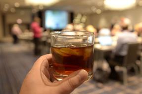 whiskey and ice in hand