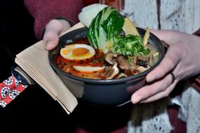 large portion of ramen with vegetables