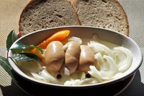 Meat sausages with onions