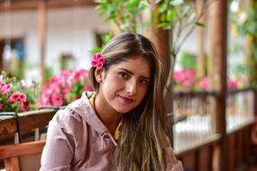 cute girl with a flower in her hair