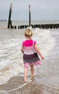 beach walk toddler girl sea
