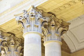 Top of the columns decorated with patterns