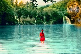 the girl in the red dress in the lake