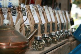 dried tea leaves in glass jars