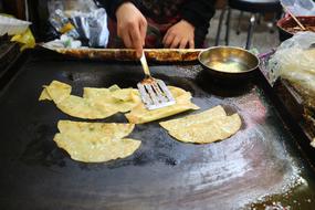 fried dumplings on the stove