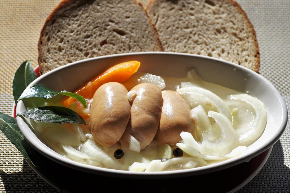 Meat sausages with onions
