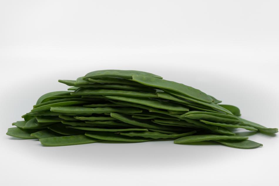 fresh green beans on a white background