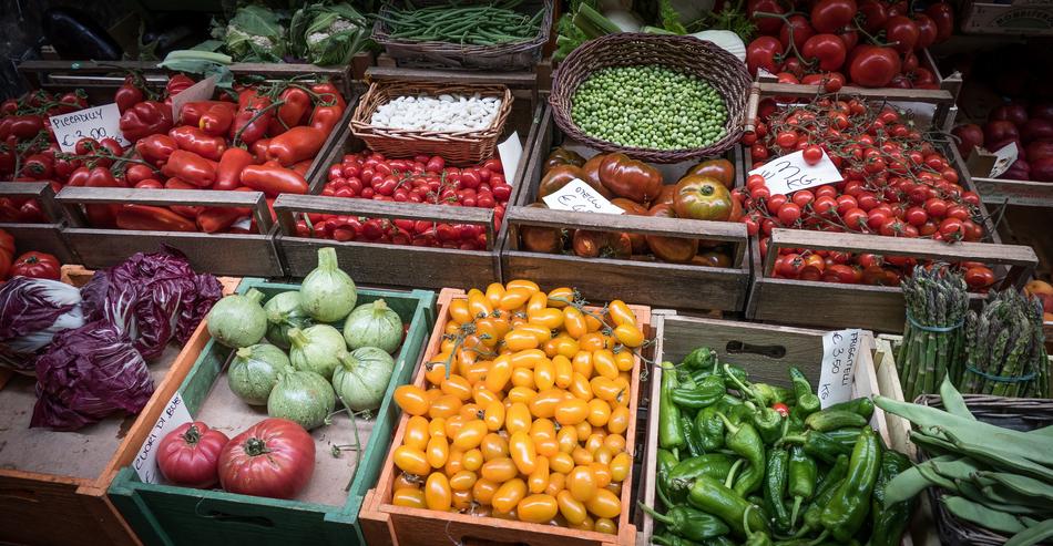ripe vegetables in boxes at the market