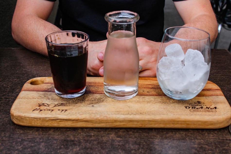 refreshing cold drink and a glass of ice