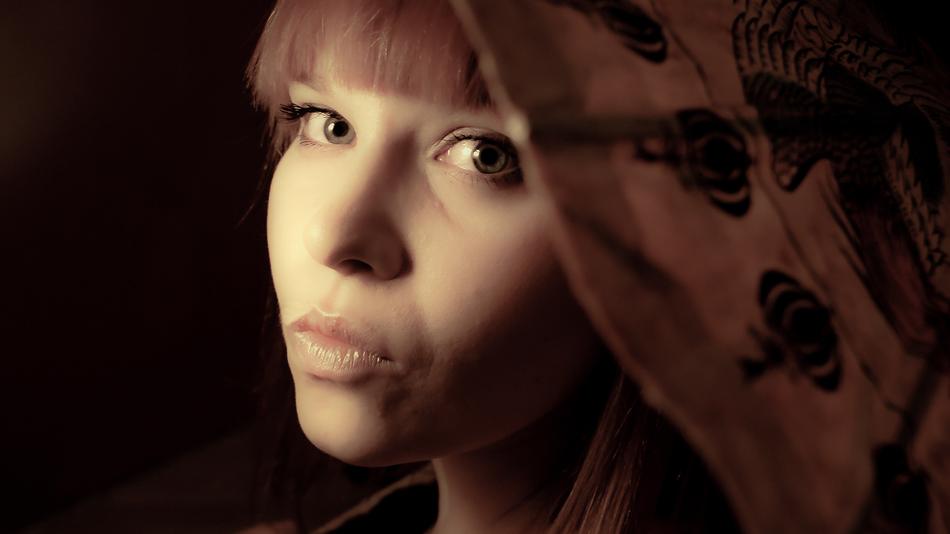 beautiful girl with an umbrella portrait
