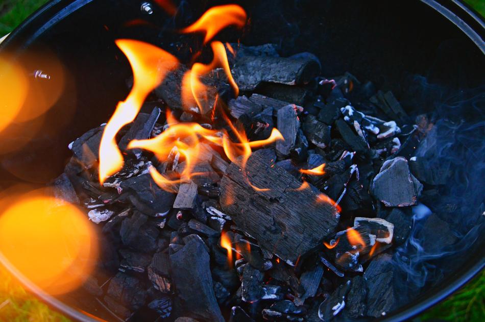 burning fire on coals in a campfire