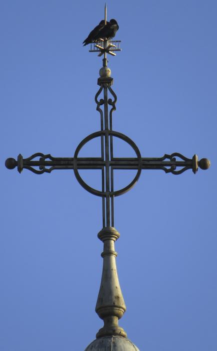 a large cross on a blue background
