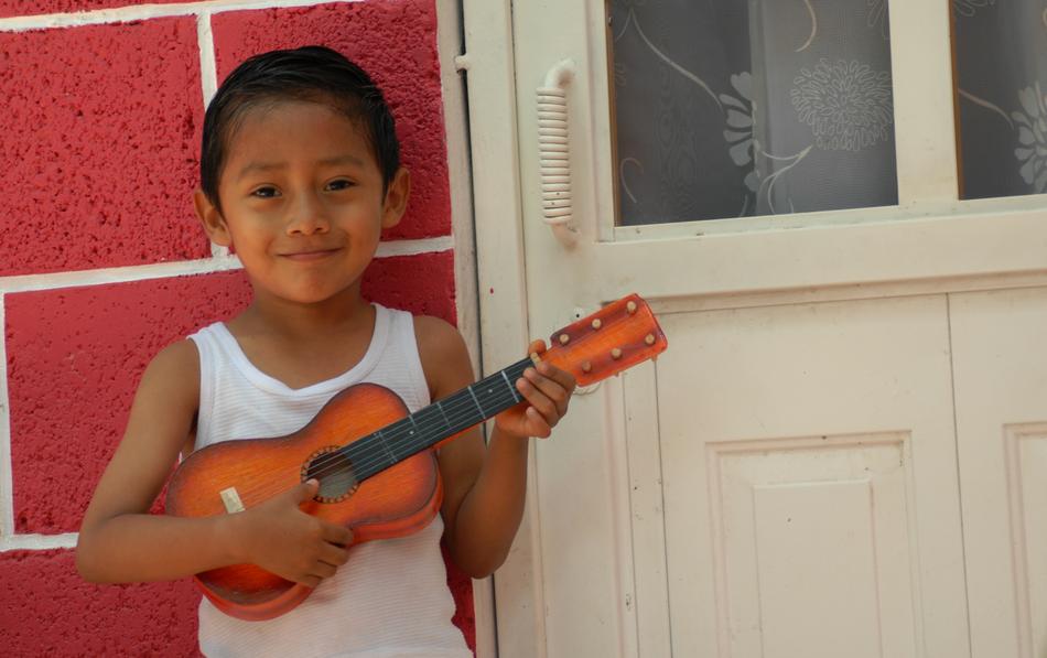 Child guitar player