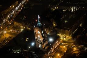 Clock tower in berlin illuminated by lights