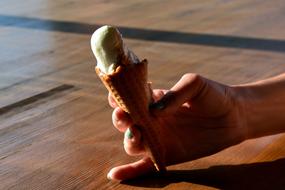 melting ice cream in your hand