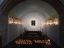 candles on the church bench