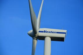 Wind Turbine Renewable Energy on a blue sky background