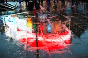 a puddle of color on the floor