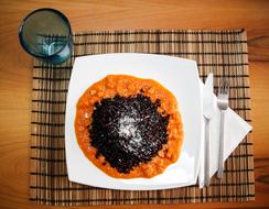 delicious dish with rice in sauce