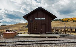 wooden house near the railroad