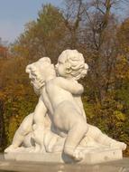 statue of kissing white angels in the park