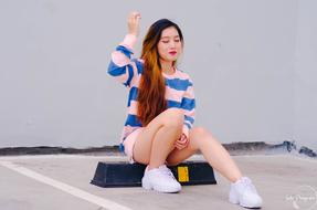 Asian girl in sneakers