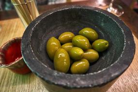 fresh green olives in a plate