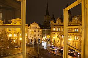 Window view of the city square in bright lights