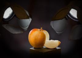 sliced apple under the light