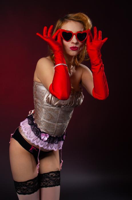 the girl with the red gloves and the glasses