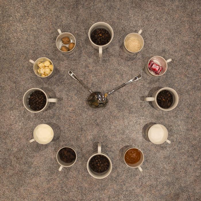 colored grains in a mug with spoons