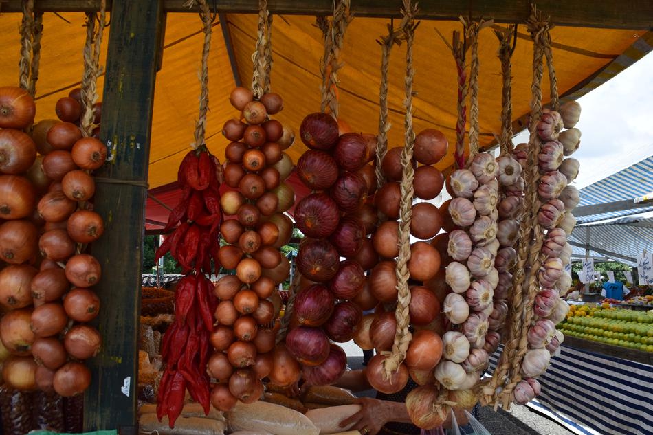 tied onions in the store