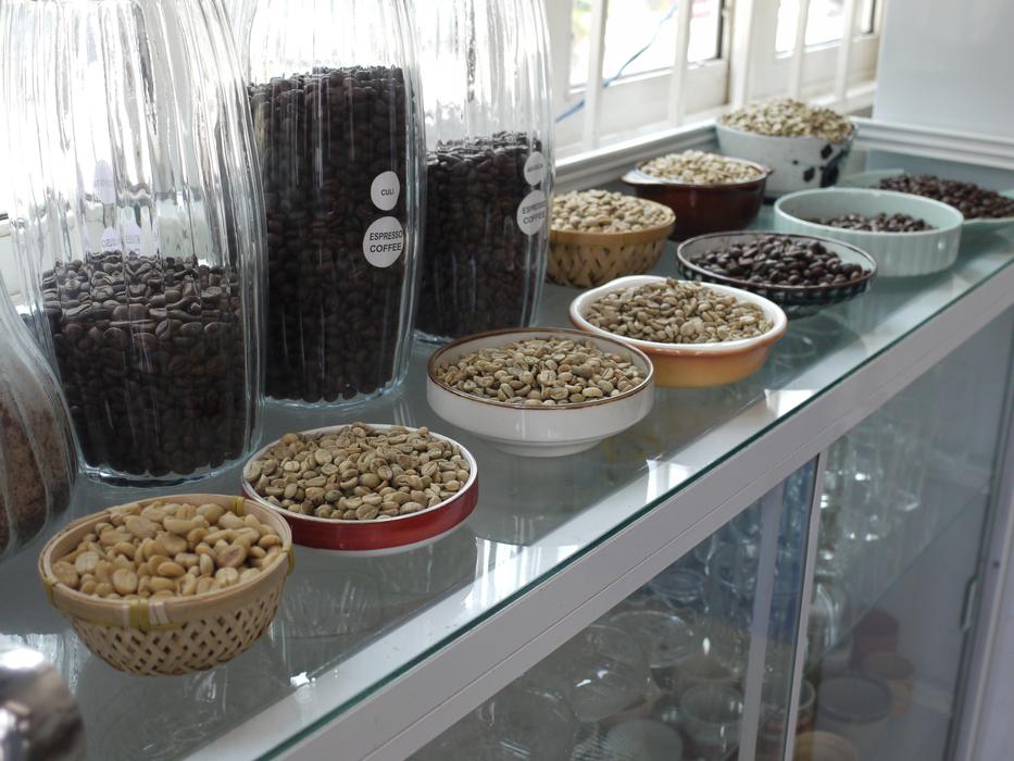 raw coffee beans in a plate