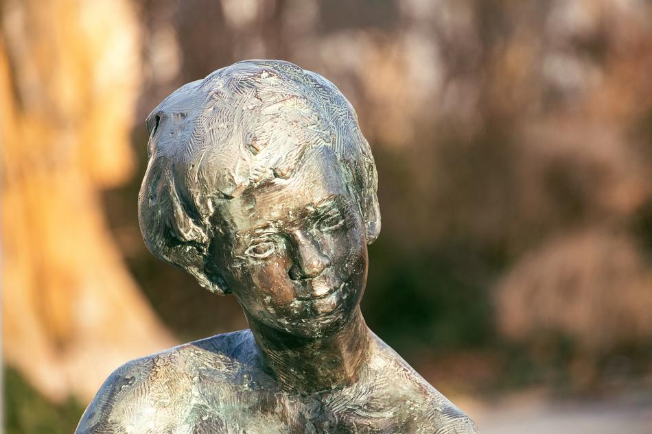bronze sculpture of a guy