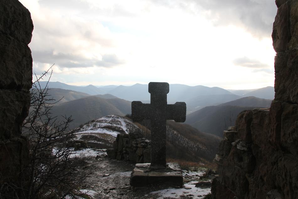 stone cross on a rock