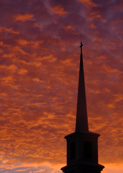 black tower at sunset
